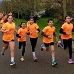 Grado se vuelca con la carrera a favor de Galbán: mucha solidaridad (y chocolate caliente)