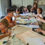 El consenso del libro de los hechizos: Laviana organiza un taller en el que los niños aprenden a reciclar y a tomar decisiones de forma democrática